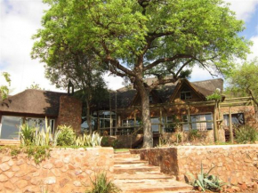 Гостиница Marula Cottage Guest Lodge  Тхабазимби